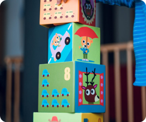 toys stacked in bedroom